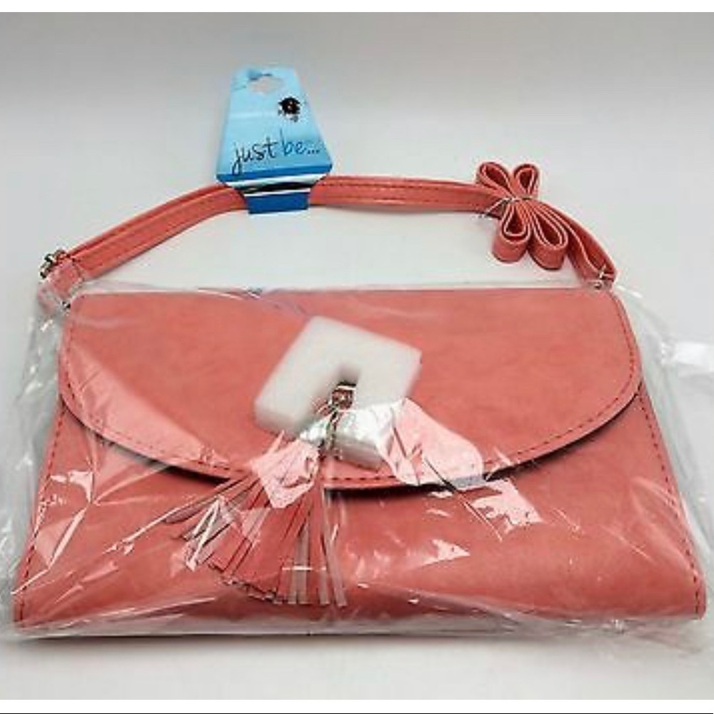 woman’s purse with tassel vegan leather